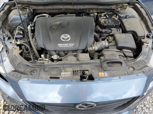 2015 Mazda 3 i Grand Touring z VIN 3MZBM1W78FM170908, wystawiony jako Copart lot #61169875 z przebiegiem 66 801 mil mil oraz Szkoda całkowita • Salvage title. Historia ofert i sprzedaży dostępna na DreamBid. Obrazek 11.