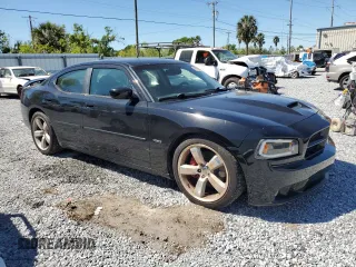 2006 Dodge Charger SRT-8 with VIN 2B3KA73W16H476021, listed as a Copart auction lot 49822835 with 197,111 mi miles and Salvage Title. Bid and sale history available at DreamBid. Image 4.