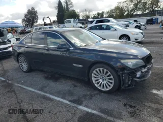2012 BMW 7 Series 750i with VIN WBAKA8C57CDS99976, listed as a Copart auction lot 45202715 with 152,169 mi miles and Salvage title. Bid and sale history available at DreamBid. Image 4.