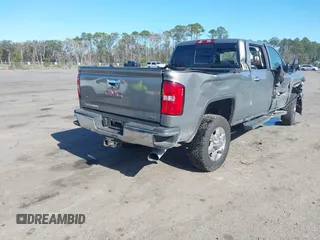 2017 GMC Sierra 2500HD SLT with VIN 1GT12TEY1HF165837, listed as a IAAI auction lot 41230286 with 167,824 mi miles. Bid and sale history available at carsss.com. Image 4.