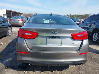 2015 Kia Optima SX Turbo with VIN 5XXGR4A62FG404441, listed as a IAAI auction lot 41662646 with 185,977 mi miles. Bid and sale history available at carsss.com. Image 16.