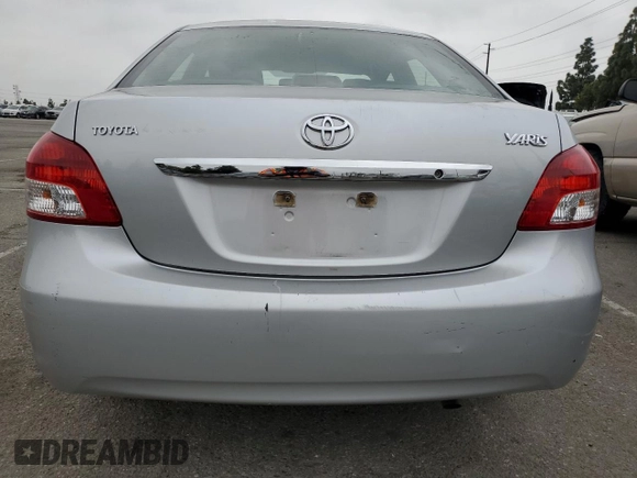 2009 Toyota Yaris z VIN JTDBT903691327542, wystawiony jako Copart lot #53231525 z przebiegiem 161 477 mil mil oraz Szkody całkowita. Historia ofert i sprzedaży dostępna na DreamBid. Obrazek 6.