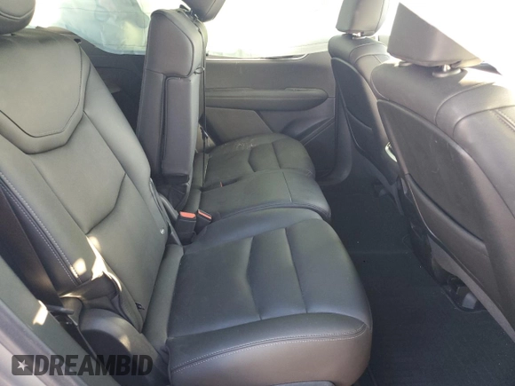 2023 Cadillac XT6 FWD Luxury z VIN 1GYKPAR48PZ115719, wystawiony jako Copart lot #87848435 z przebiegiem 17 597 mil mil oraz Szkoda całkowita • Salvage title. Historia ofert i sprzedaży dostępna na DreamBid. Obrazek 11.