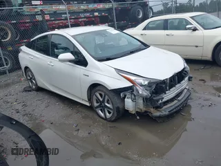 2016 Toyota Prius Four z VIN JTDKARFU9G3023659, wystawiony jako IAAI lot #42221644 z przebiegiem 165 091 mil mil oraz . Historia ofert i sprzedaży dostępna na DreamBid. Obrazek 1.