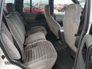 1995 Jeep Grand Cherokee Laredo z VIN 1J4GZ58S2SC578183, wystawiony jako Copart lot #61665955 z przebiegiem 341 135 mil mil oraz Szkoda całkowita • Salvage title. Historia ofert i sprzedaży dostępna na DreamBid. Obrazek 10.