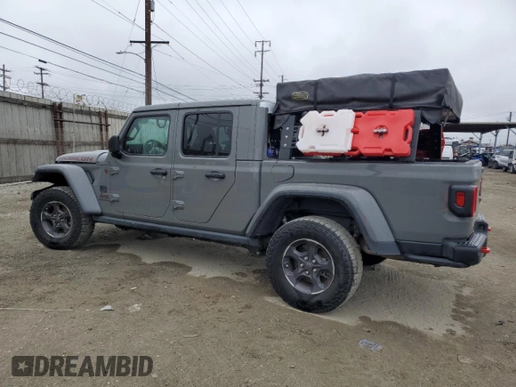 2021 Jeep Gladiator Rubicon with VIN 1C6JJTBG5ML615653, listed as a Copart auction lot 51297795 with 48,918 mi miles and Salvage title. Bid and sale history available at DreamBid. Image 2.