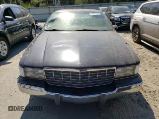 1994 Cadillac Fleetwood z VIN 1G6DW52PXRR704063, wystawiony jako Copart lot #75345394 z przebiegiem 96 067 mil mil oraz Szkody całkowita. Historia ofert i sprzedaży dostępna na DreamBid. Obrazek 5.