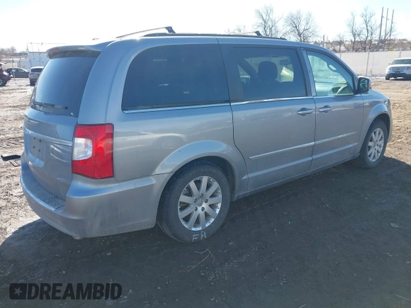 2014 Chrysler Town & Country Touring with VIN 2C4RC1BG8ER208400, listed as a IAAI auction lot 41611970 with 105,589 mi miles. Bid and sale history available at carsss.com. Image 4.