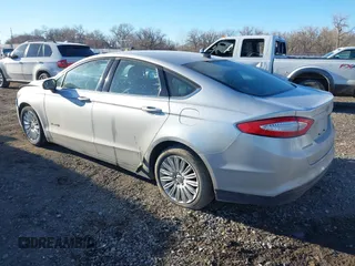 2015 Ford Fusion S Hybrid with VIN 3FA6P0UU7FR307568, listed as a IAAI auction lot 41421139 with 152,186 mi miles. Bid and sale history available at carsss.com. Image 3.