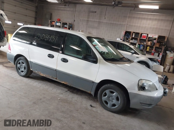 2006 Ford Freestar Cargo with VIN 2FTZA54666BA14556, listed as a IAAI auction lot 42103437 with 147,998 mi miles. Bid and sale history available at carsss.com. Image 1.
