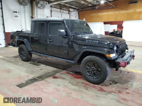 2021 Jeep Gladiator Willys with VIN 1C6HJTAG4ML556255, listed as a Copart auction lot 57143125 with 57,104 mi miles and Salvage title. Bid and sale history available at DreamBid. Image 4.