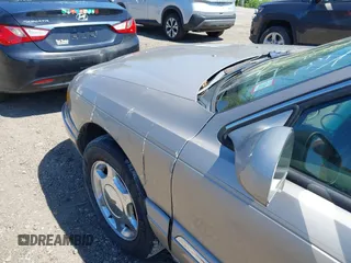 2001 Lincoln Continental z VIN 1LNHM97V31Y638576, wystawiony jako IAAI lot #42305531 z przebiegiem Nie podano mil oraz . Historia ofert i sprzedaży dostępna na DreamBid. Obrazek 6.
