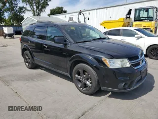 2015 Dodge Journey SXT with VIN 3C4PDCBG6FT743028, listed as a Copart auction lot 63286595 with 148,595 mi miles and Salvage title. Bid and sale history available at DreamBid. Image 4.