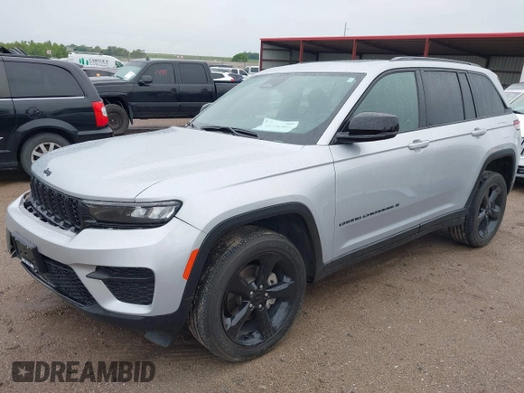 2023 Jeep Grand Cherokee Altitude with VIN 1C4RJHAG8PC611840, listed as a IAAI auction lot 42336992 with 41,100 mi miles and . Bid and sale history available at DreamBid. Image 18.