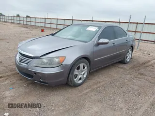2006 Acura RL z VIN JH4KB16526C006190, wystawiony jako IAAI lot #42351400 z przebiegiem 150 749 mil mil oraz . Historia ofert i sprzedaży dostępna na DreamBid. Obrazek 2.