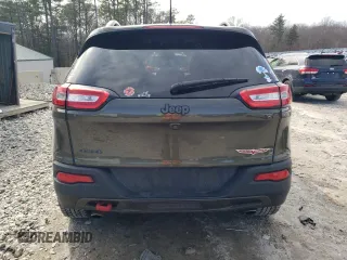 2015 Jeep Cherokee Trailhawk with VIN 1C4PJMBS5FW725729, listed as a Copart auction lot 49943495 with 139,796 mi miles and Clean Title. Bid and sale history available at carsss.com. Image 6.