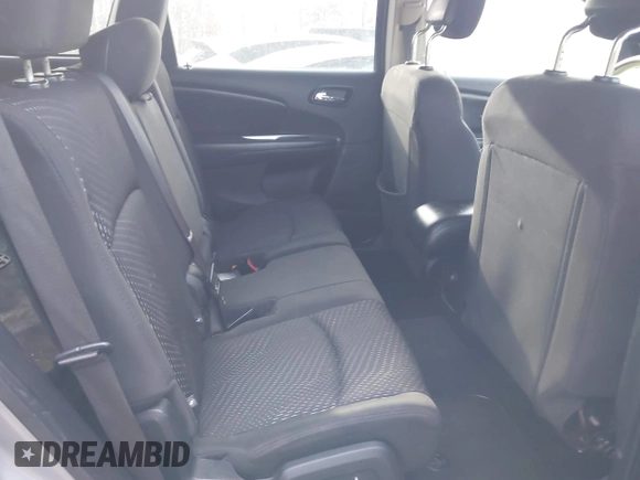 2015 Dodge Journey SE z VIN 3C4PDCAB3FT641675, wystawiony jako IAAI lot #41898611 z przebiegiem 218 121 mil mil oraz . Historia ofert i sprzedaży dostępna na DreamBid. Obrazek 8.