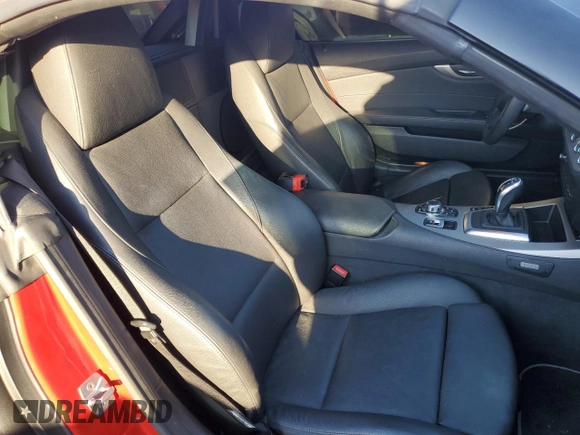 2011 BMW Z4 sDrive35is z VIN WBALM1C54BE393857, wystawiony jako Copart lot #72769234 z przebiegiem 88 986 mil mil oraz Szkoda całkowita • Salvage title. Historia ofert i sprzedaży dostępna na DreamBid. Obrazek 10.
