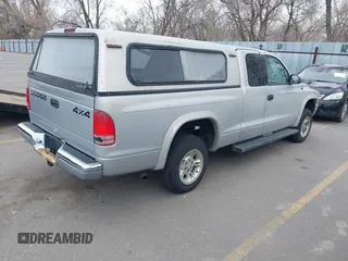 1999 Dodge Dakota SLT with VIN 1B7GG22YXXS255021, listed as a IAAI auction lot 41809325 with 204,352 mi miles and . Bid and sale history available at carsss.com. Image 4.