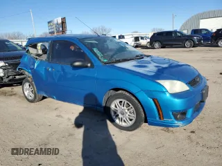 2007 Ford Focus S z VIN 1FAFP31N77W244856, wystawiony jako Copart lot #88972705 z przebiegiem Nie podano mil oraz Szkoda całkowita • Salvage title. Historia ofert i sprzedaży dostępna na DreamBid. Obrazek 4.