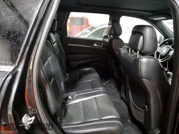 2014 Jeep Grand Cherokee Overland with VIN 1C4RJFCT9EC264594, listed as a Copart auction lot 50071695 with 124,712 mi miles and Clean Title. Bid and sale history available at DreamBid. Image 11.