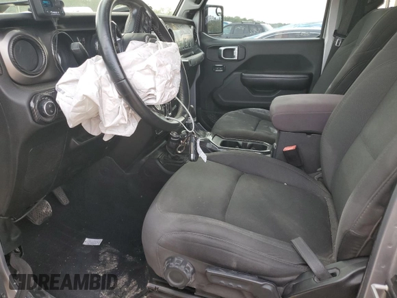 2020 Jeep Gladiator Sport S with VIN 1C6HJTAG9LL127546, listed as a Copart auction lot 54955945 with 99,511 mi miles and Salvage title. Bid and sale history available at DreamBid. Image 7.
