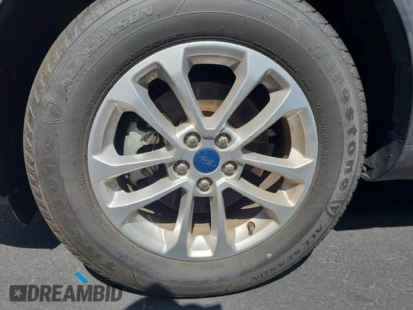 2020 Ford Escape SE with VIN 1FMCU9G67LUB25778, listed as a IAAI auction lot 42550089 with 84,502 mi miles and . Bid and sale history available at DreamBid. Image 8.