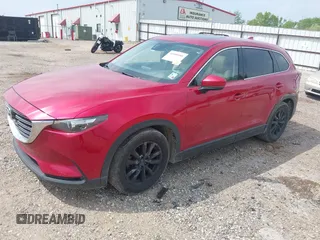 2016 Mazda CX-9 Touring z VIN JM3TCACY0G0101617, wystawiony jako IAAI lot #41850485 z przebiegiem 292 880 mil mil oraz . Historia ofert i sprzedaży dostępna na DreamBid. Obrazek 2.