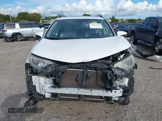 2018 Toyota RAV4 XLE with VIN JTMWFREV7JJ174483, listed as a IAAI auction lot 41597797 with 82,836 mi miles. Bid and sale history available at carsss.com. Image 13.
