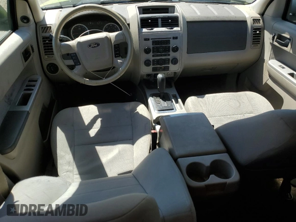 2012 Ford Escape XLT z VIN 1FMCU0D74CKA12634, wystawiony jako Copart lot #56332815 z przebiegiem 149 390 mil mil oraz Szkoda całkowita • Salvage title. Historia ofert i sprzedaży dostępna na DreamBid. Obrazek 8.