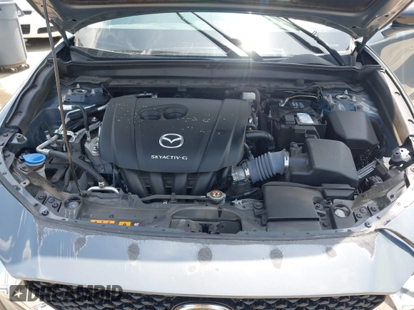 2022 Mazda CX-30 S Carbon Edition with VIN 3MVDMBCL6NM410330, listed as a IAAI auction lot 42107426 with 30,277 mi miles and . Bid and sale history available at DreamBid. Image 10.