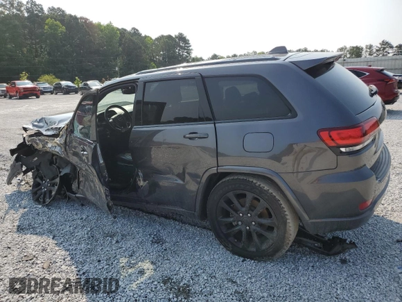 2018 Jeep Grand Cherokee Altitude with VIN 1C4RJEAG4JC145023, listed as a Copart auction lot 59001735 with 127,627 mi miles and Salvage title. Bid and sale history available at DreamBid. Image 2.