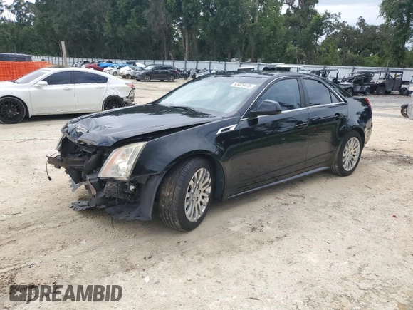 2013 Cadillac CTS Premium with VIN 1G6DP5E34D0112743, listed as a Copart auction lot 63029475 with 132,020 mi miles and Salvage title. Bid and sale history available at DreamBid. Image 1.