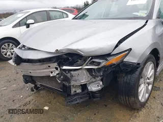2020 Toyota Camry LE with VIN 4T1C11AK5LU869525, listed as a IAAI auction lot 41693706 with 134,201 mi miles. Bid and sale history available at carsss.com. Image 6.