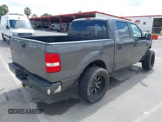 2005 Ford F-150 XLT with VIN 1FTPW12525KC03172, listed as a IAAI auction lot 42139841 with 125,258 mi miles. Bid and sale history available at carsss.com. Image 4.