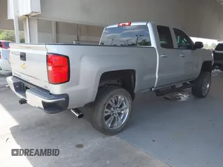 2019 Chevrolet Silverado 1500 LT with VIN 2GCVKPEC4K1139373, listed as a IAAI auction lot 42198276 with 76,844 mi miles and . Bid and sale history available at DreamBid. Image 4.