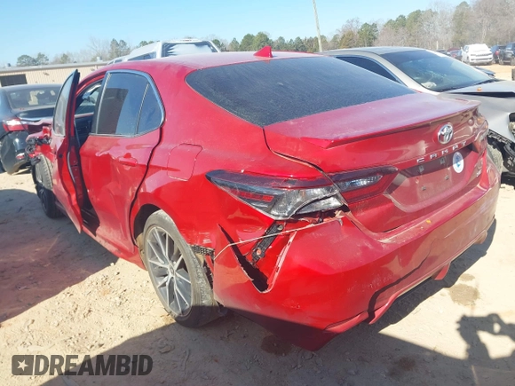 2023 Toyota Camry SE with VIN 4T1G11AK9PU157316, listed as a IAAI auction lot 41595697 with 60,233 mi miles and . Bid and sale history available at DreamBid. Image 3.