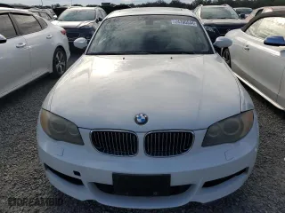 2009 BMW 1 Series 135i with VIN WBAUC73509VK94795, listed as a Copart auction lot 74760544 with 0 mi miles and Salvage Title. Bid and sale history available at carsss.com. Image 5.