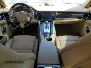 2015 Porsche Panamera 4 z VIN WP0AA2A78FL007374, wystawiony jako Copart lot #45906263 z przebiegiem 121 659 mil mil oraz . Historia ofert i sprzedaży dostępna na DreamBid. Obrazek 8.