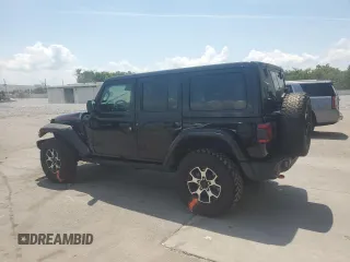 2022 Jeep Wrangler Unlimited Rubicon with VIN 1C4HJXFG1NW193437, listed as a Copart auction lot 57137365 with 56,732 mi miles and Salvage title. Bid and sale history available at DreamBid. Image 2.