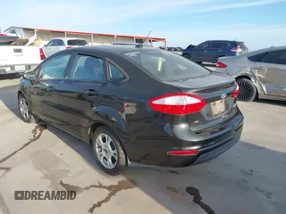 2014 Ford Fiesta SE with VIN 3FADP4BJ0EM139467, listed as a IAAI auction lot 41817437 with 45,570 mi miles and . Bid and sale history available at DreamBid. Image 3.