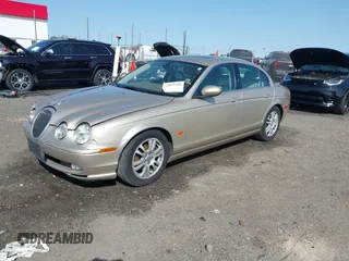 2005 Jaguar S-Type with VIN SAJWA01T95FN22745, listed as a IAAI auction lot 41898269 with 57,614 mi miles and . Bid and sale history available at DreamBid. Image 17.