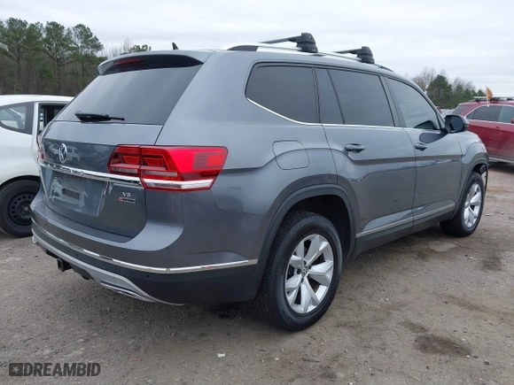 2018 Volkswagen Atlas 3.6L V6 SEL with VIN 1V2MR2CA7JC543769, listed as a IAAI auction lot 41479621 with 122,699 mi miles. Bid and sale history available at carsss.com. Image 4.