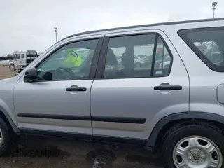 2006 Honda CR-V LX with VIN JHLRD78536C035954, listed as a IAAI auction lot 42043220 with 250,337 mi miles and . Bid and sale history available at carsss.com. Image 14.