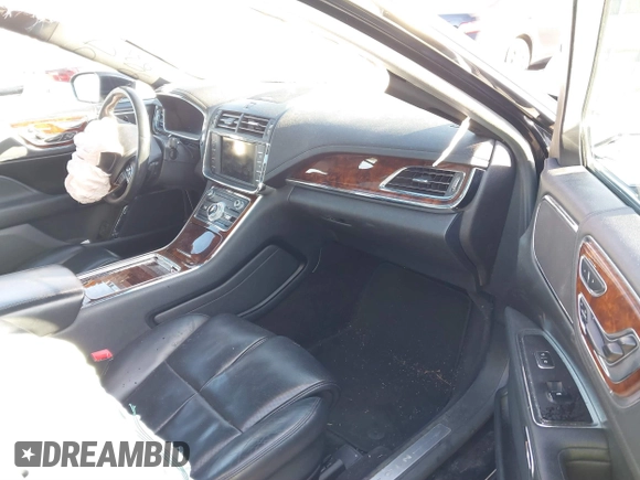 2017 Lincoln Continental Reserve with VIN 1LN6L9RP3H5628165, listed as a IAAI auction lot 41489434 with 143,171 mi miles. Bid and sale history available at carsss.com. Image 5.