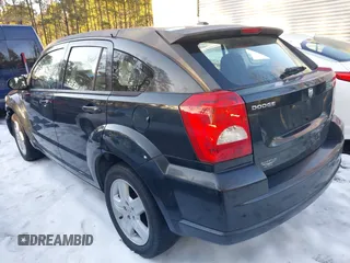 2009 Dodge Caliber SXT with VIN 1B3HB48A89D118869, listed as a IAAI auction lot 41315552 with 198,986 mi miles and . Bid and sale history available at DreamBid. Image 3.