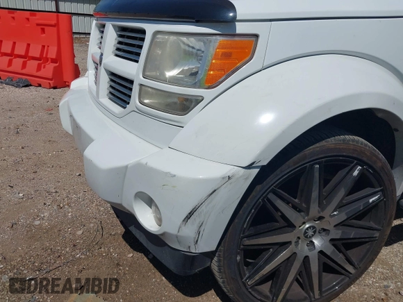 2011 Dodge Nitro Heat with VIN 1D4PT4GX9BW587284, listed as a IAAI auction lot 41998357 with 100,366 mi miles and . Bid and sale history available at DreamBid. Image 6.