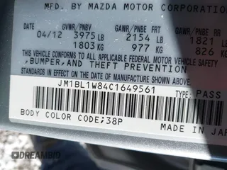 2012 Mazda Mazda3 i Grand Touring with VIN JM1BL1W84C1649561, listed as a IAAI auction lot 41268507 with 39,478 mi miles. Bid and sale history available at carsss.com. Image 9.