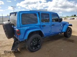 2024 Jeep Wrangler Sahara with VIN 1C4RJXP60RW163829, listed as a Copart auction lot 57182365 with 16,873 mi miles and Salvage title. Bid and sale history available at DreamBid. Image 3.