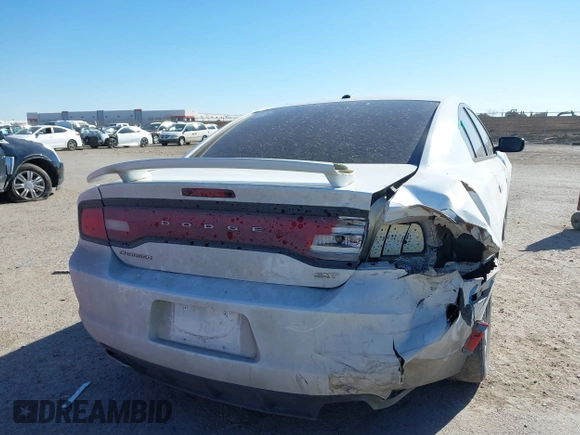 2014 Dodge Charger SXT with VIN 2C3CDXHG2EH104640, listed as a IAAI auction lot 41379760 with 122,664 mi miles and . Bid and sale history available at DreamBid. Image 6.